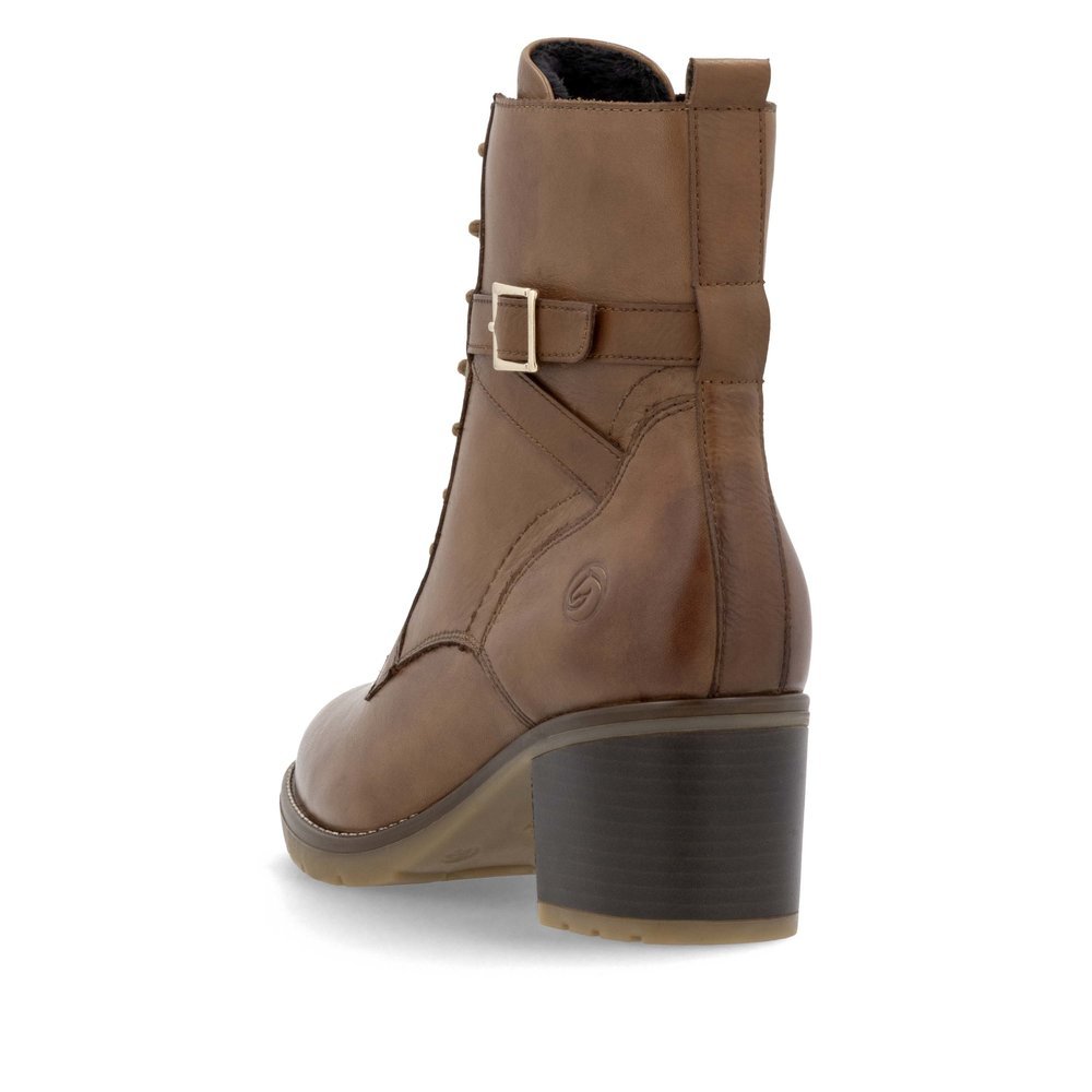 Brown remonte women´s ankle boots D2A74-24 with decorative buckle as well as zipper. Shoe from the back.