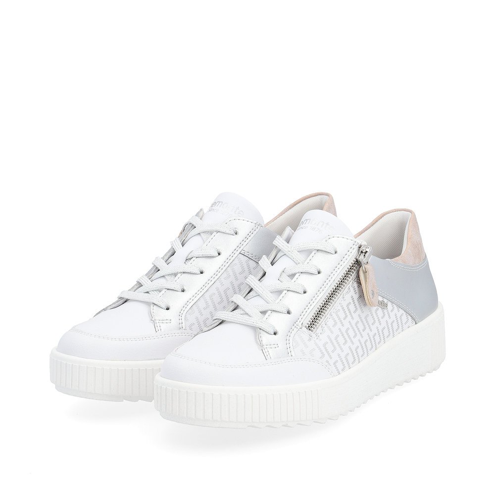Frost white remonte women´s sneakers R7901-81 with zipper and graphical pattern. Shoes laterally.