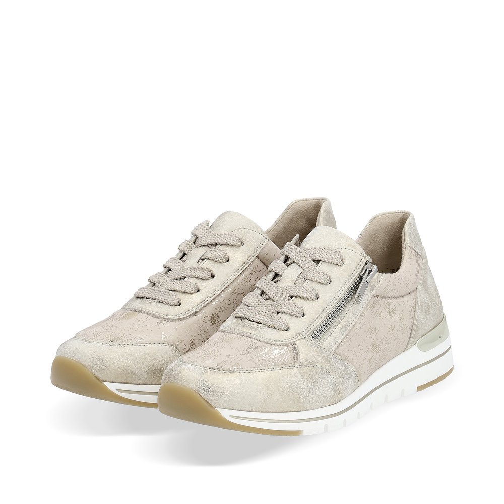 Beige remonte women´s sneakers R6700-61 with zipper and comfort width G. Shoes laterally.