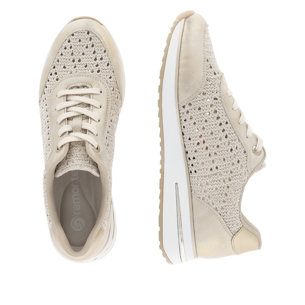 Beige remonte women´s sneakers D1G04-60 with a lacing and perforated look. Shoe from the top, lying.