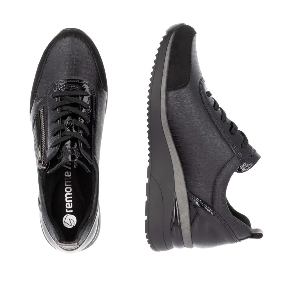 Black remonte women´s sneakers D2401-06 with a zipper as well as comfort width G. Shoe from the top, lying.