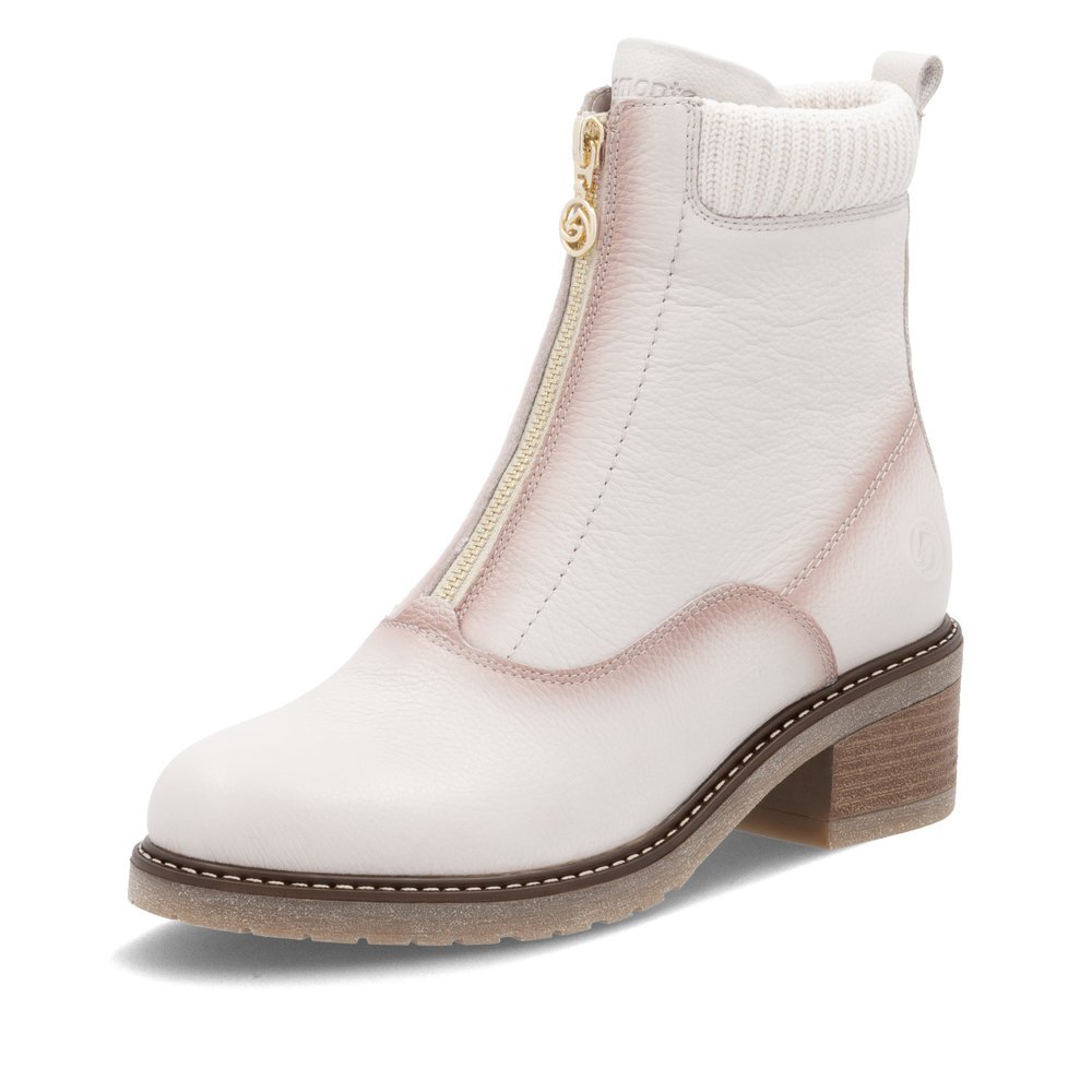 Bottines remonte blanches pour femme D1A80-80 avec fermeture éclair. Chaussure inclinée sur le côté.