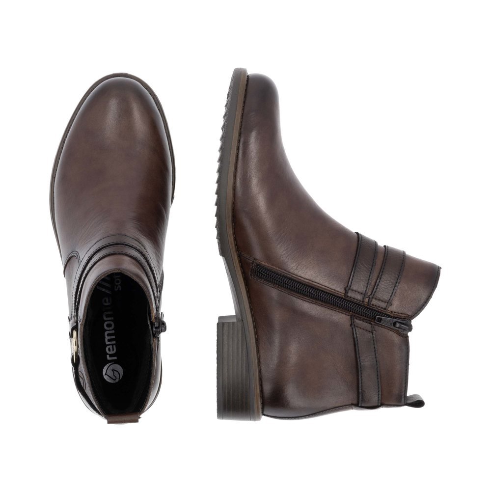 Espressobraune remonte Damen Stiefeletten D0F77-25 mit Schmuck-Element. Schuh von oben, liegend.