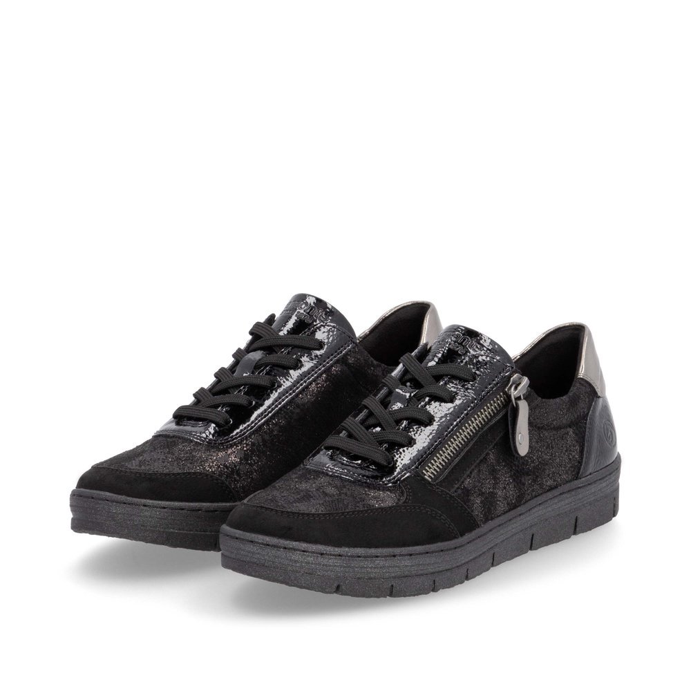 Black remonte women´s sneakers D5831-03 with a zipper as well as a removable insole. Shoes laterally.