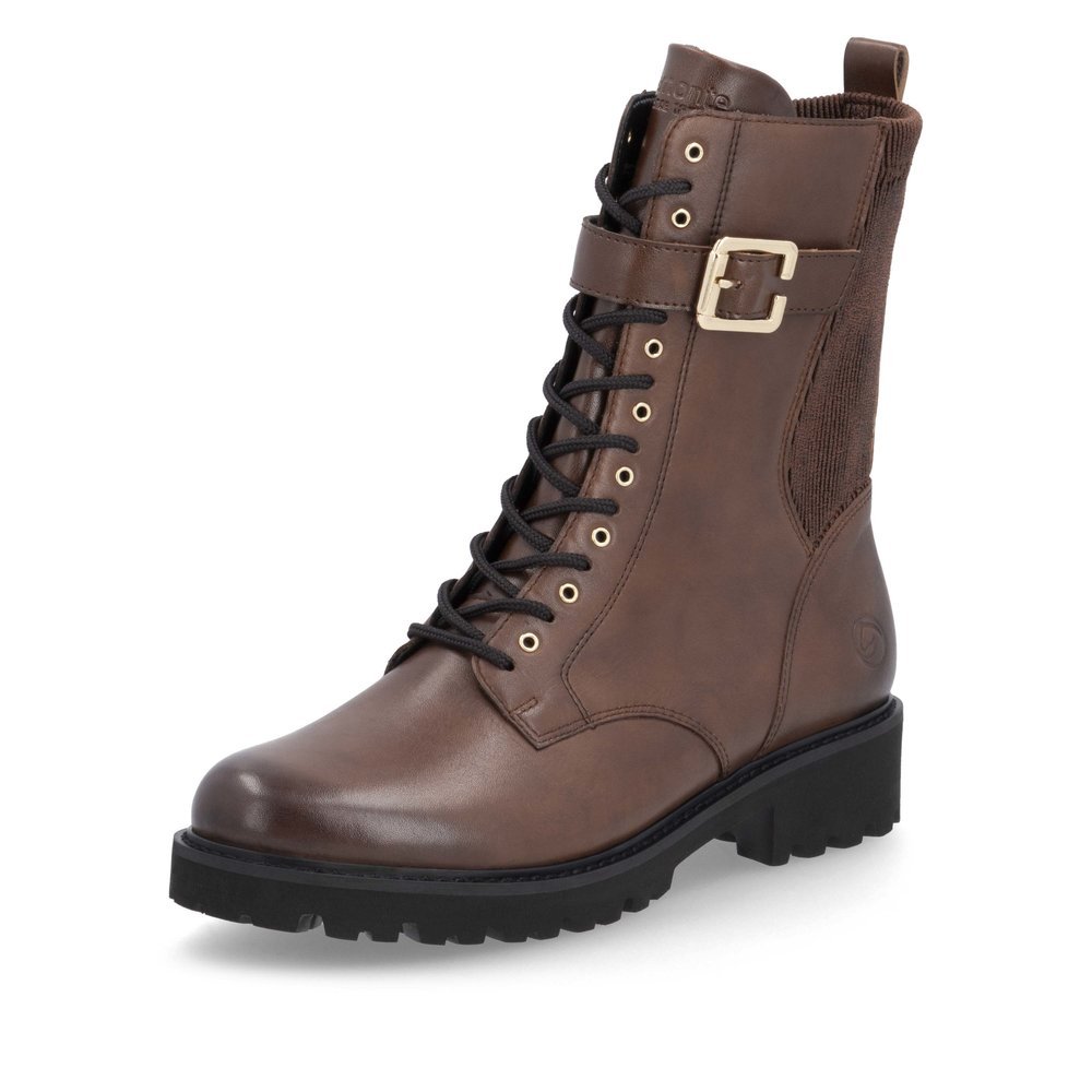 Brown remonte women´s biker boots D8664-25 with decorative buckle as well as zipper. Shoe laterally.