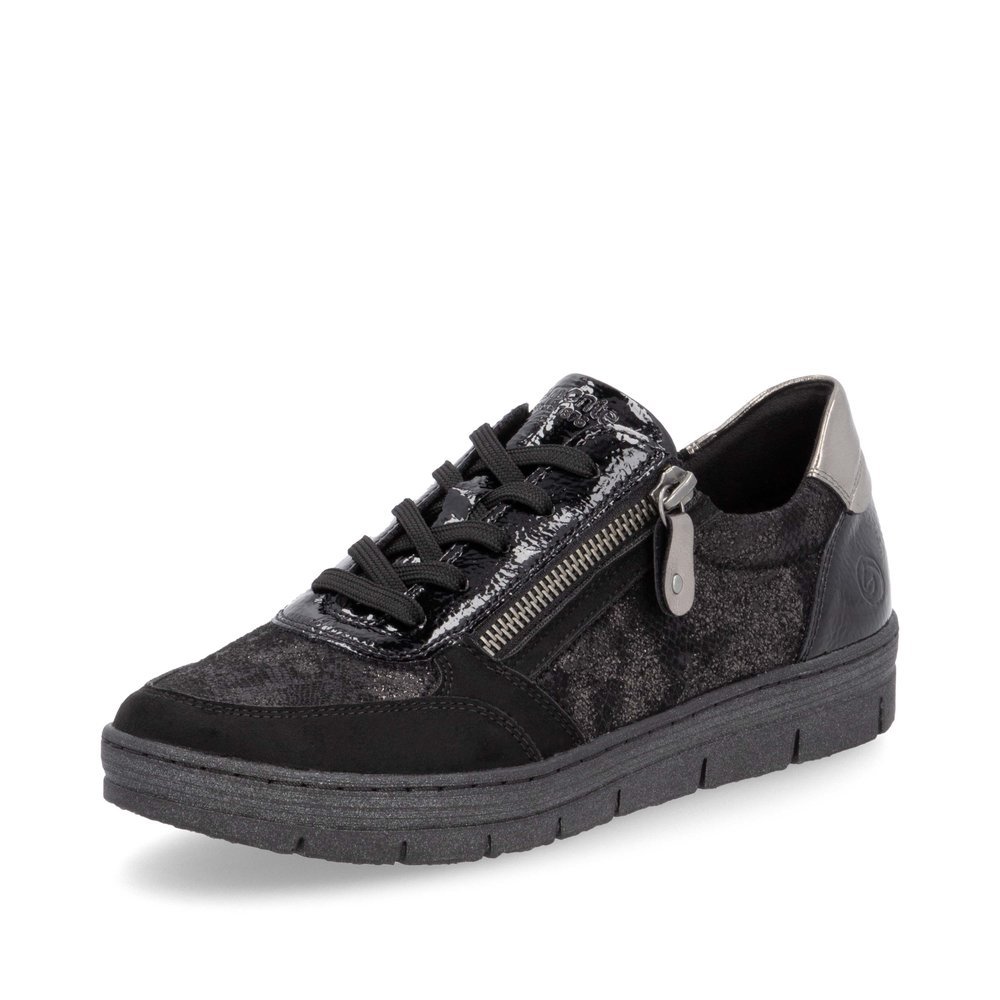 Black remonte women´s sneakers D5831-03 with a zipper as well as a removable insole. Shoe laterally.