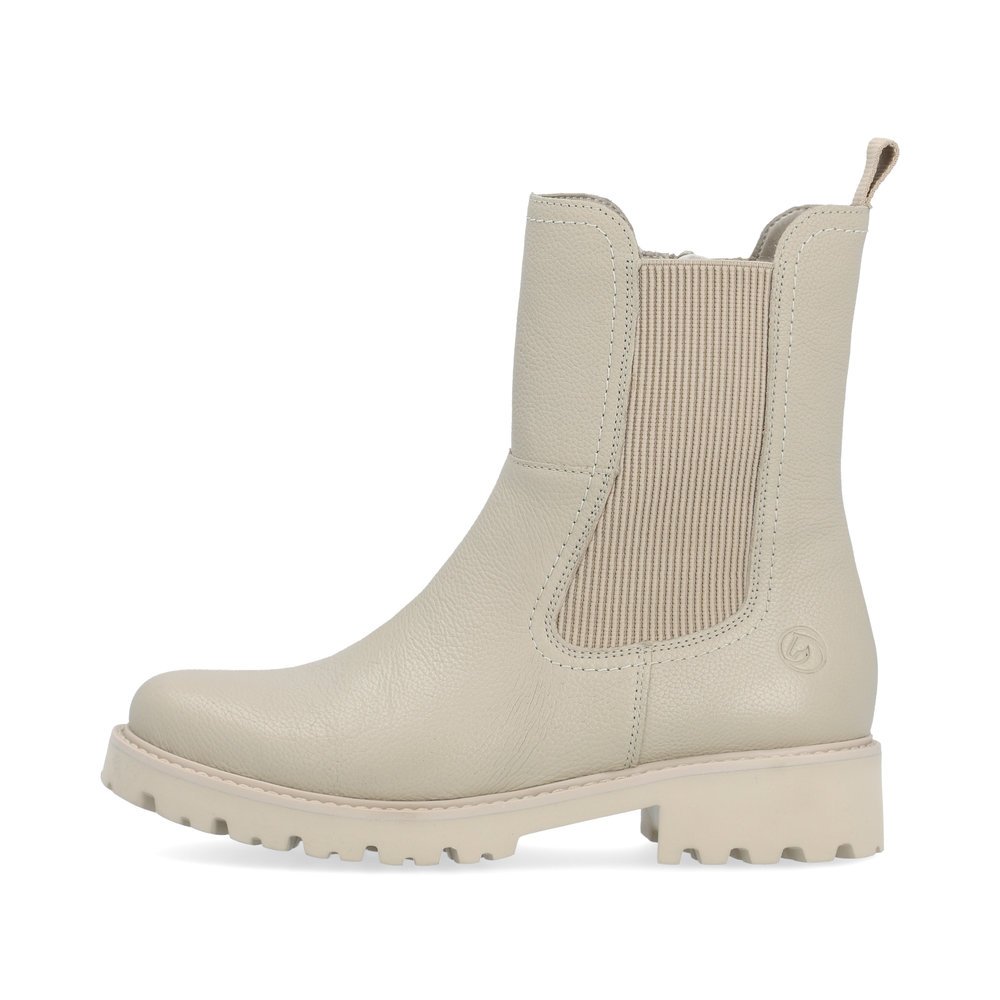 Beige remonte women´s Chelsea boots D8694-60 with zipper as well as comfort width G. Outside of the shoe.