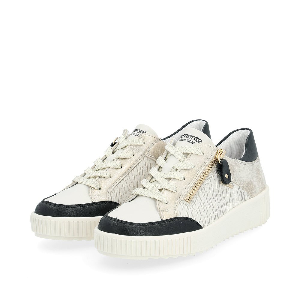 Cream white remonte women´s sneakers R7901-80 with a zipper and graphical pattern. Shoes laterally.