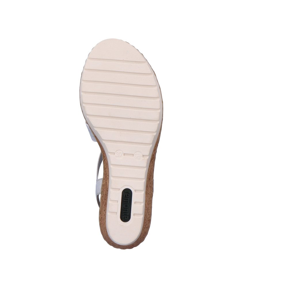 White remonte women´s wedge sandals R6264-80 with an elastic insert. Outsole of the shoe.