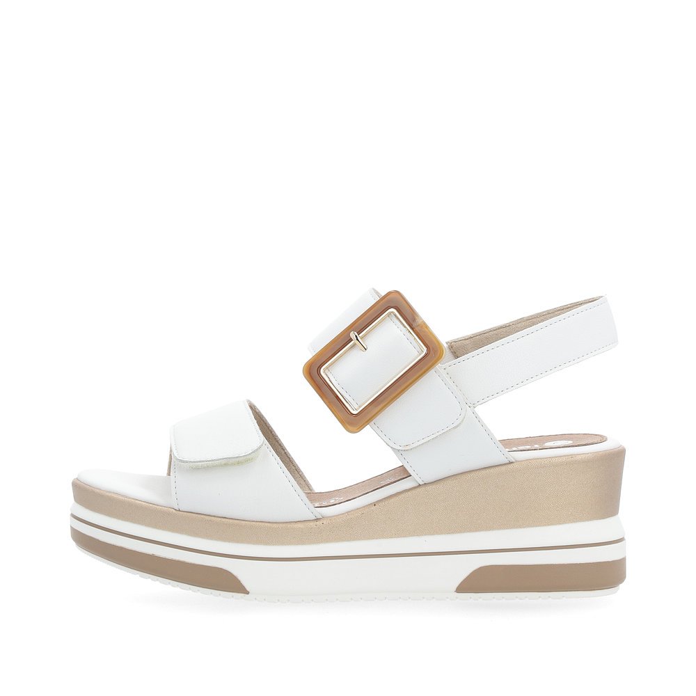 Pure white remonte women´s wedge sandals D1P50-80 with a hook and loop fastener. Outside of the shoe.