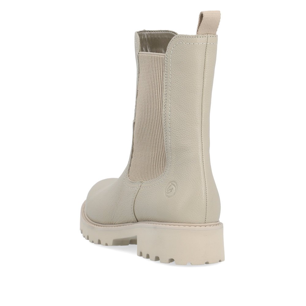 Beige remonte women´s Chelsea boots D8694-60 with zipper as well as comfort width G. Shoe from the back.