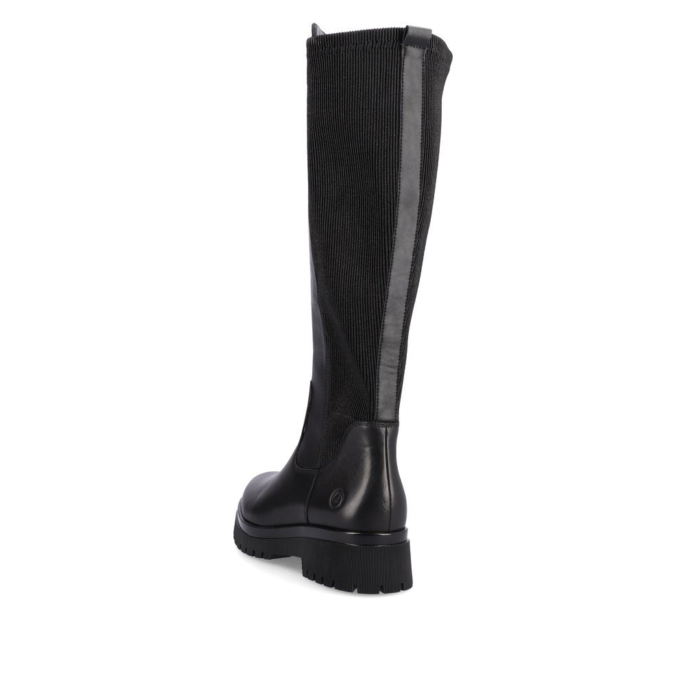 Black remonte women´s high boots D1B71-01 with a zipper as well as comfort width G. Shoe from the back.