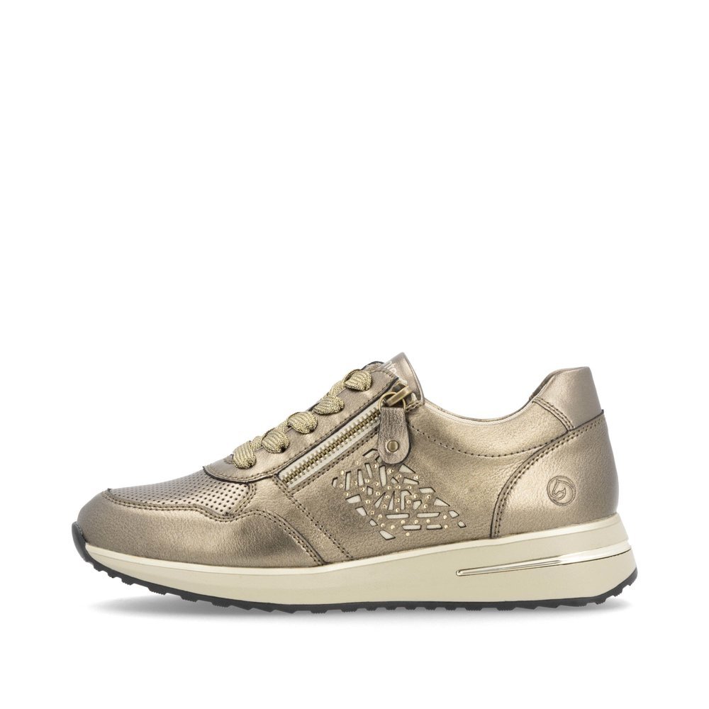 Beige remonte women´s sneakers D1G00-90 with a stylish cut-outs as well as a zipper. Outside of the shoe.