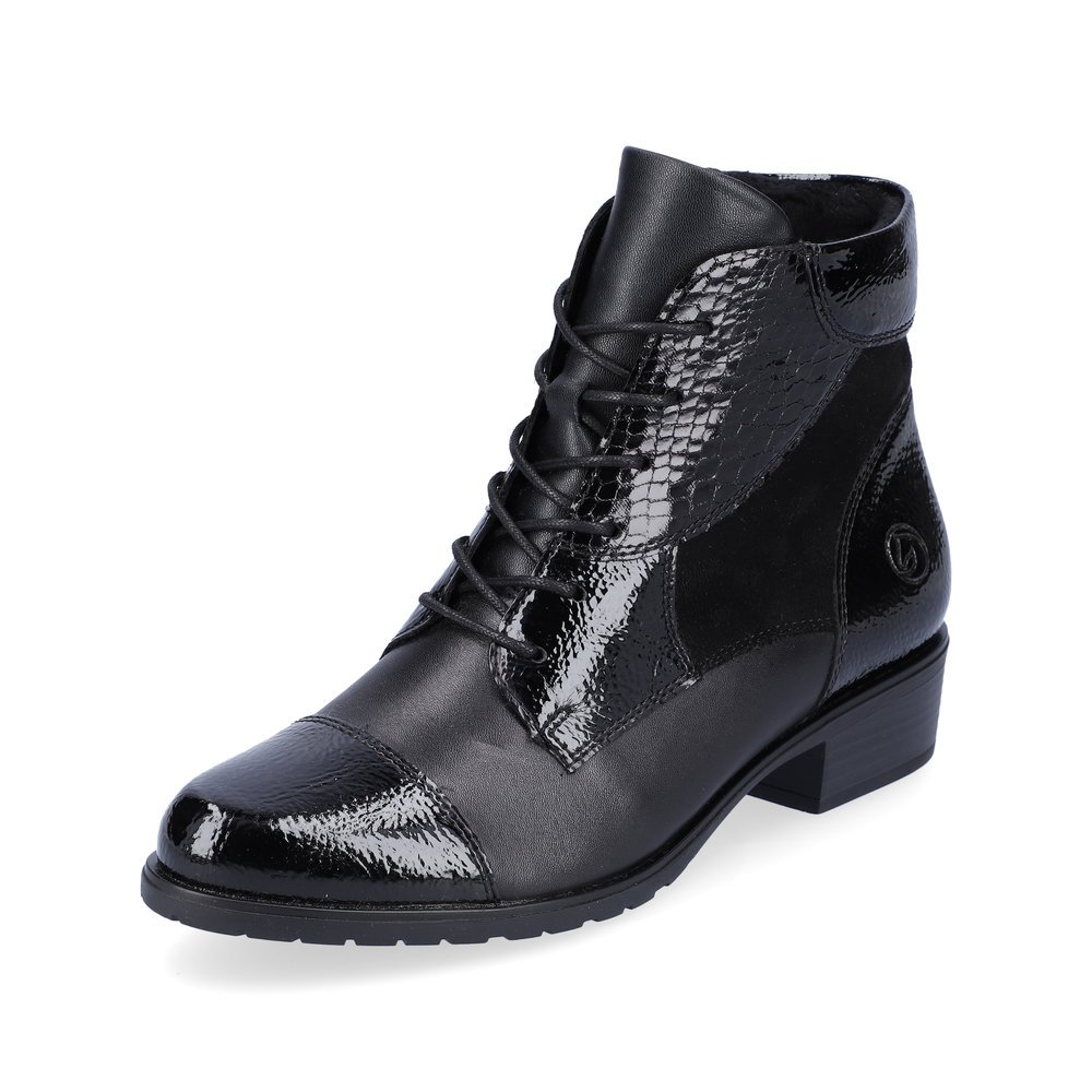 Bottines remonte noires pour femme D6882-01 avec fermeture éclair. Chaussure inclinée sur le côté.