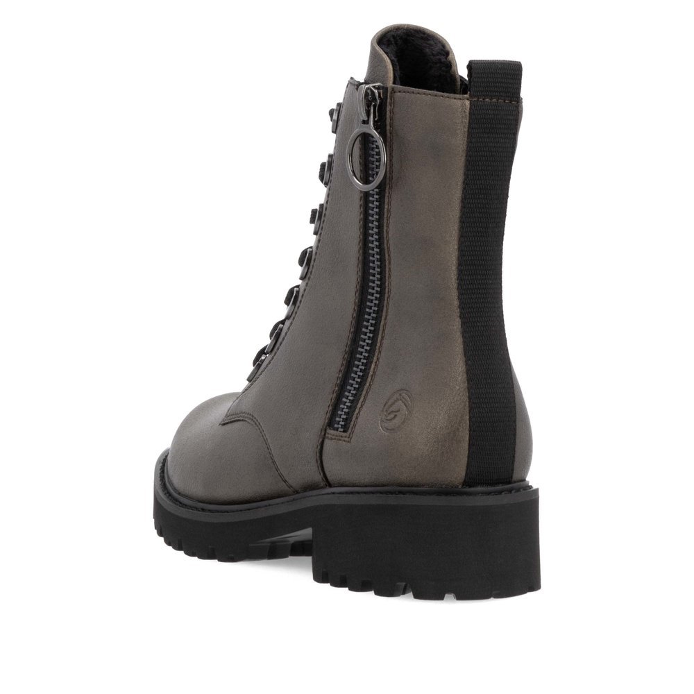 Metallic brown remonte women´s biker boots D8671-92 with a distinctive eyelets. Shoe from the back.