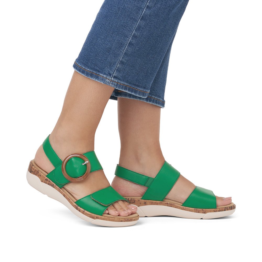 Emerald green remonte women´s strap sandals R6853-53 with a hook and loop fastener. Shoe on foot.