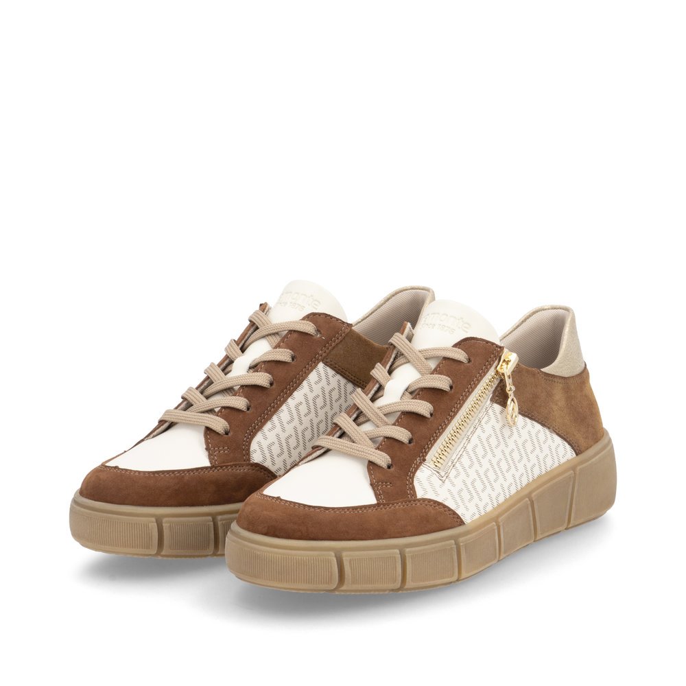 Beige remonte women´s sneakers D1T00-60 with a remonte pendant as well as a zipper. Shoes laterally.