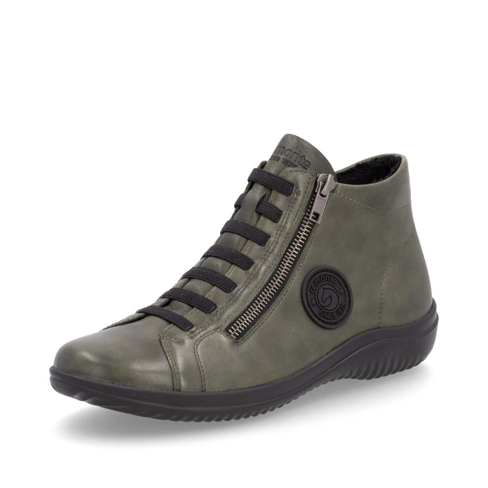 Chaussures à lacets remonte vertes pour femme D1E70-52 avec logo noir. Chaussure inclinée sur le côté.