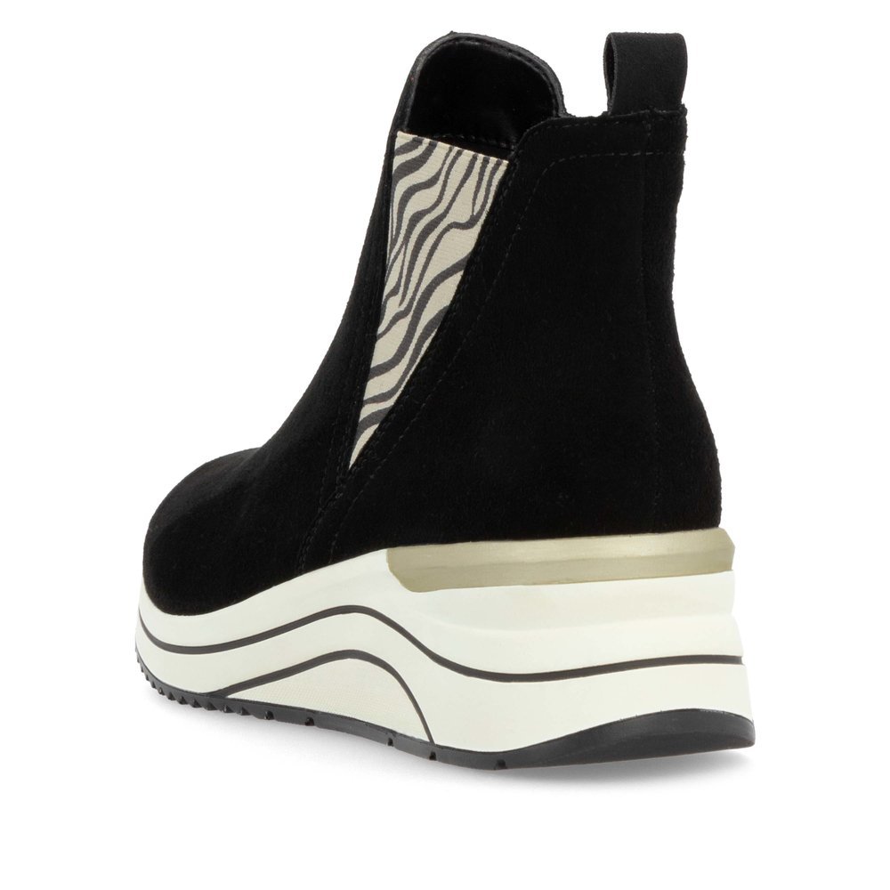 Black remonte women´s Chelsea boots D0T75-03 with an animal print as well as zipper. Shoe from the back.