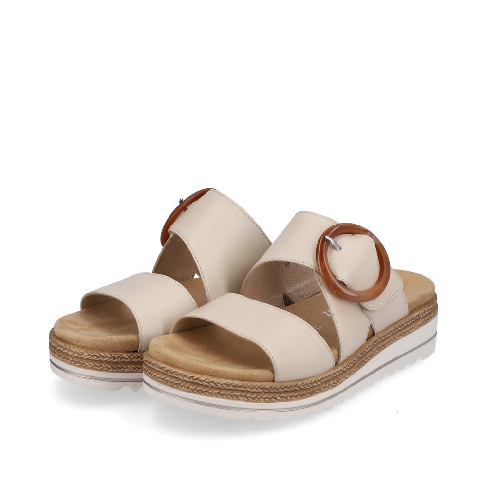 Vanilla beige remonte women´s mules D0Q51-80 with a hook and loop fastener. Shoes laterally.