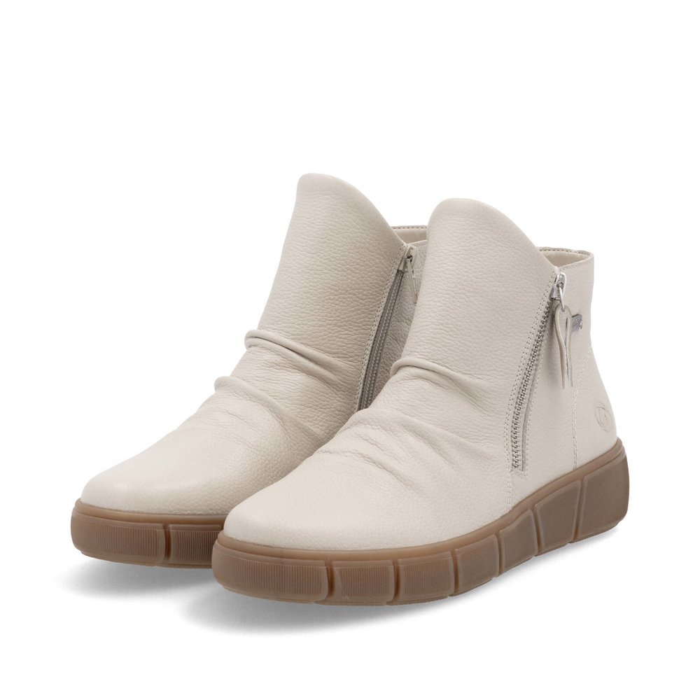 Cream beige remonte women´s ankle boots D1T73-60 with remonteTEX technology. Shoes laterally.