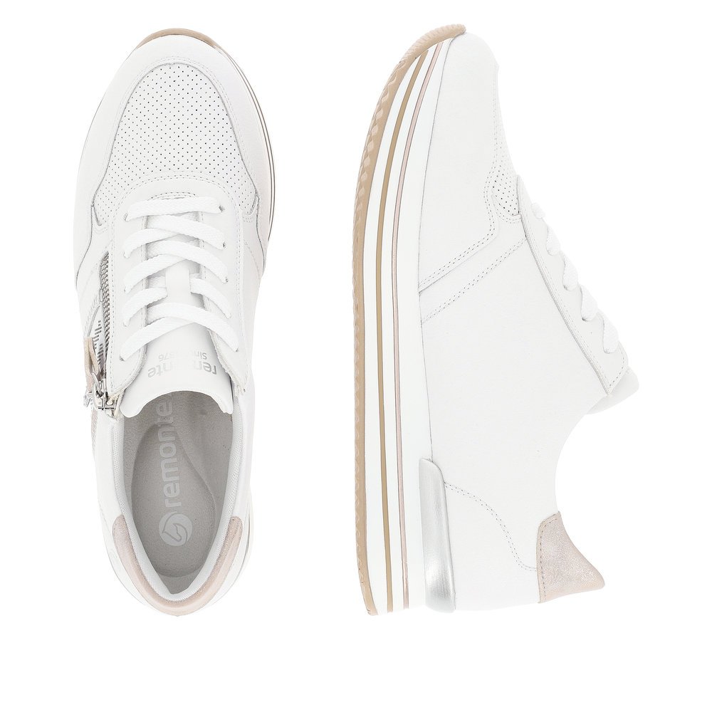 White remonte women´s sneakers D1318-80 with a zipper and decorative stitching. Shoe from the top, lying.