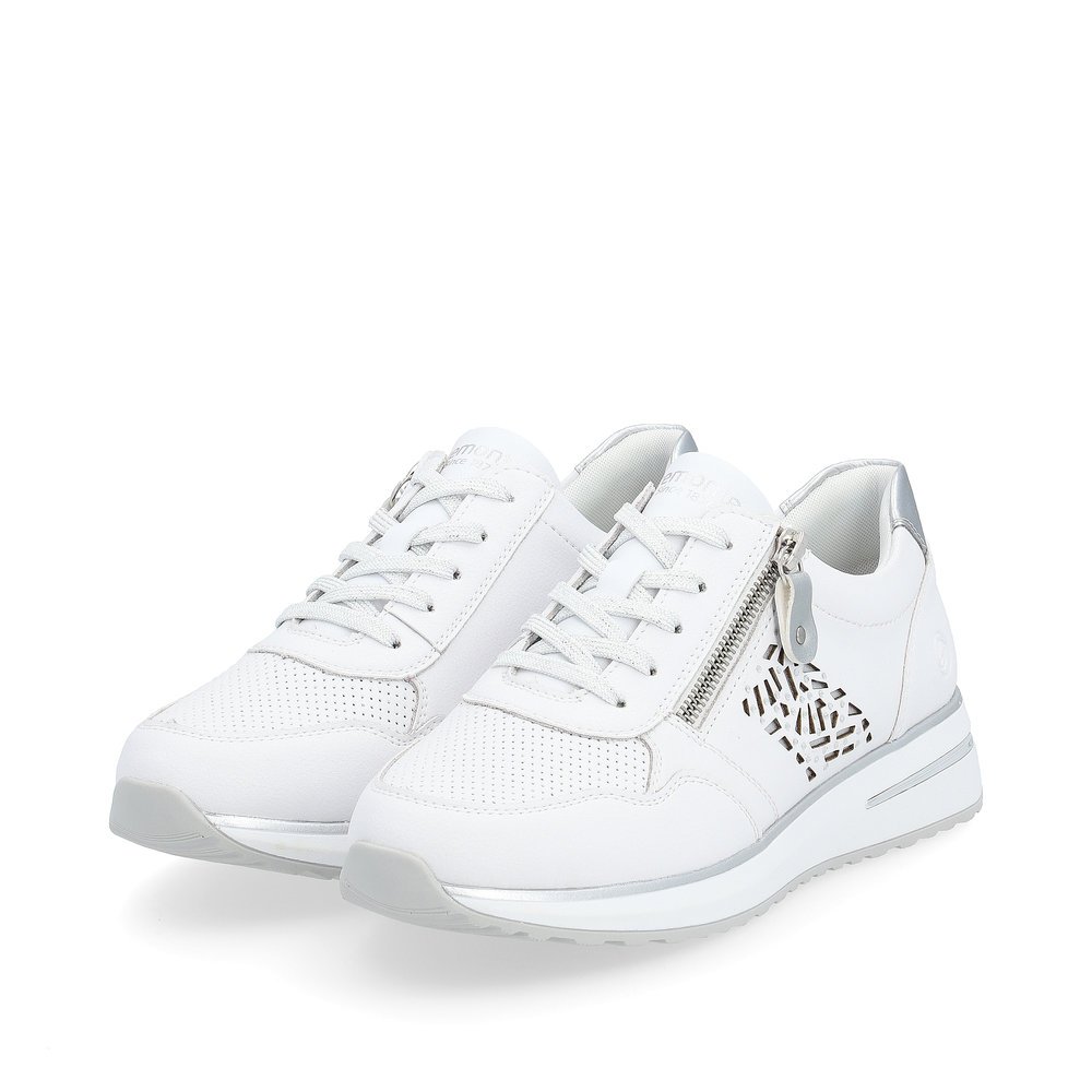 White remonte women´s sneakers D1G00-80 with zipper and cut-outs on the side. Shoes laterally.
