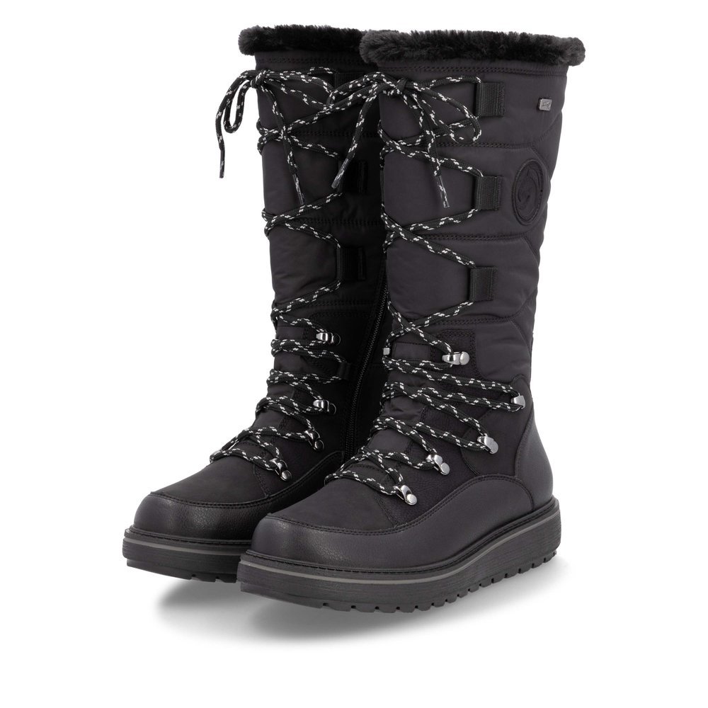 Night black remonte women´s high boots D0U77-00 with a Flip-Grip sole with spikes. Shoes laterally.