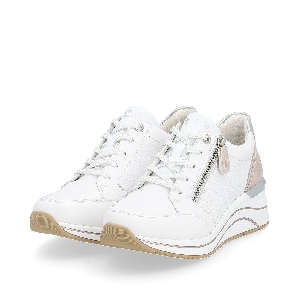 Brilliant white remonte women´s sneakers D0T03-80 with a zipper and extra width H. Shoes laterally.
