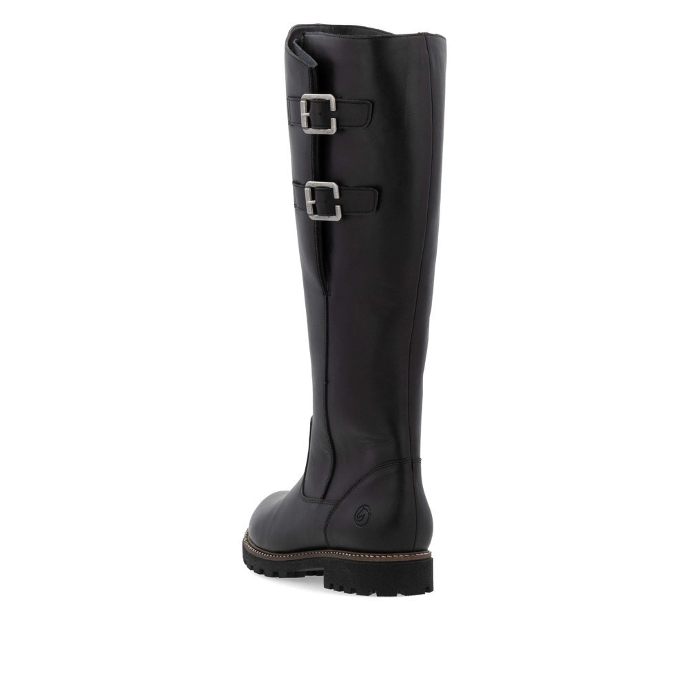 Black remonte women´s high boots D8486-00 with decorative buckles as well as zipper. Shoe from the back.