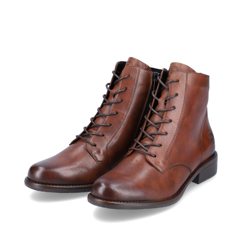 Bottines remonte marron pour femme D0F73-22 avec fermeture éclair. Chaussures inclinées sur le côté.