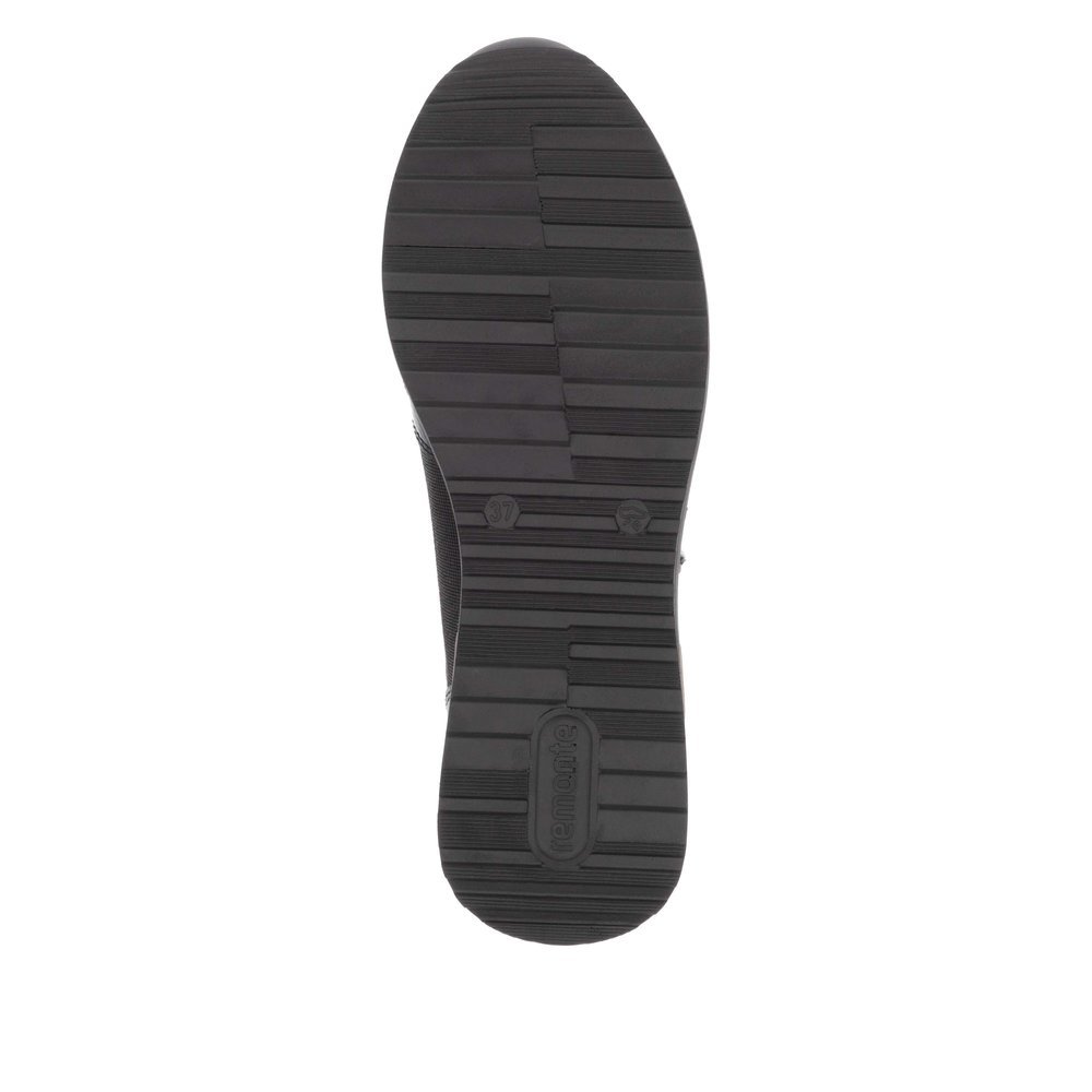 Black vegan remonte women´s sneakers D1G08-03 with zipper as well as padded insole. Outsole of the shoe.