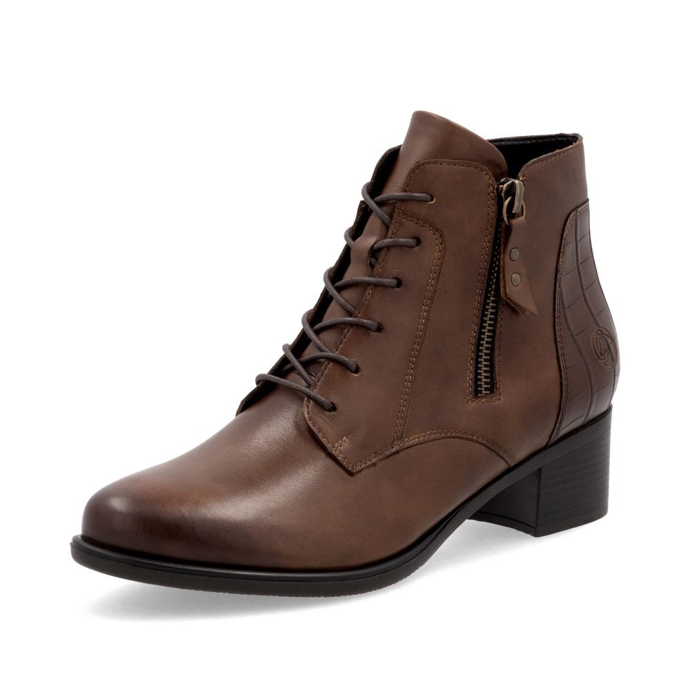 Bottines remonte marron pour femme R5187-22 avec fermeture éclair. Chaussure inclinée sur le côté.