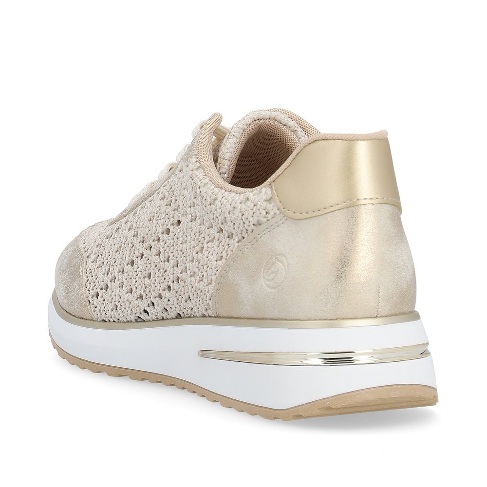 Beige remonte women´s sneakers D1G04-60 with a lacing and perforated look. Shoe from the back.