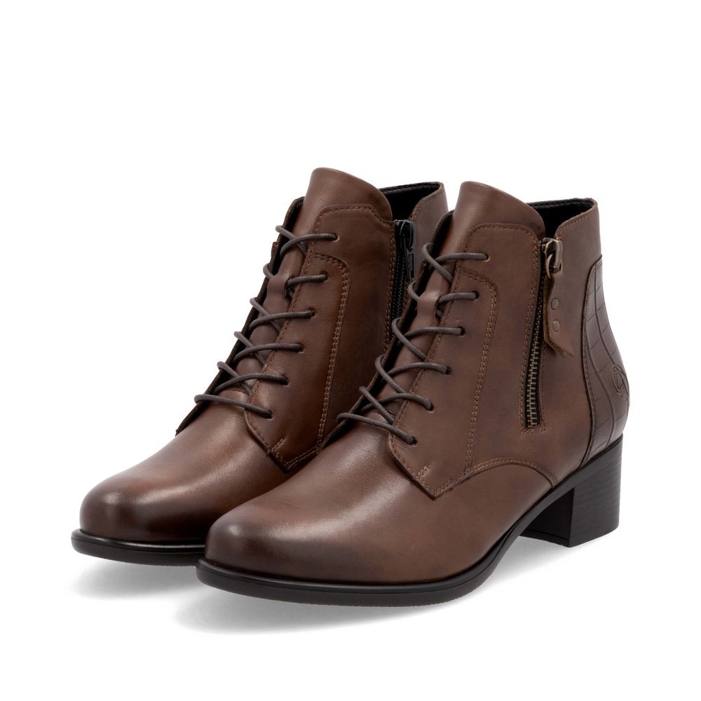 Bottines remonte marron pour femme R5187-22 avec fermeture éclair. Chaussures inclinées sur le côté.