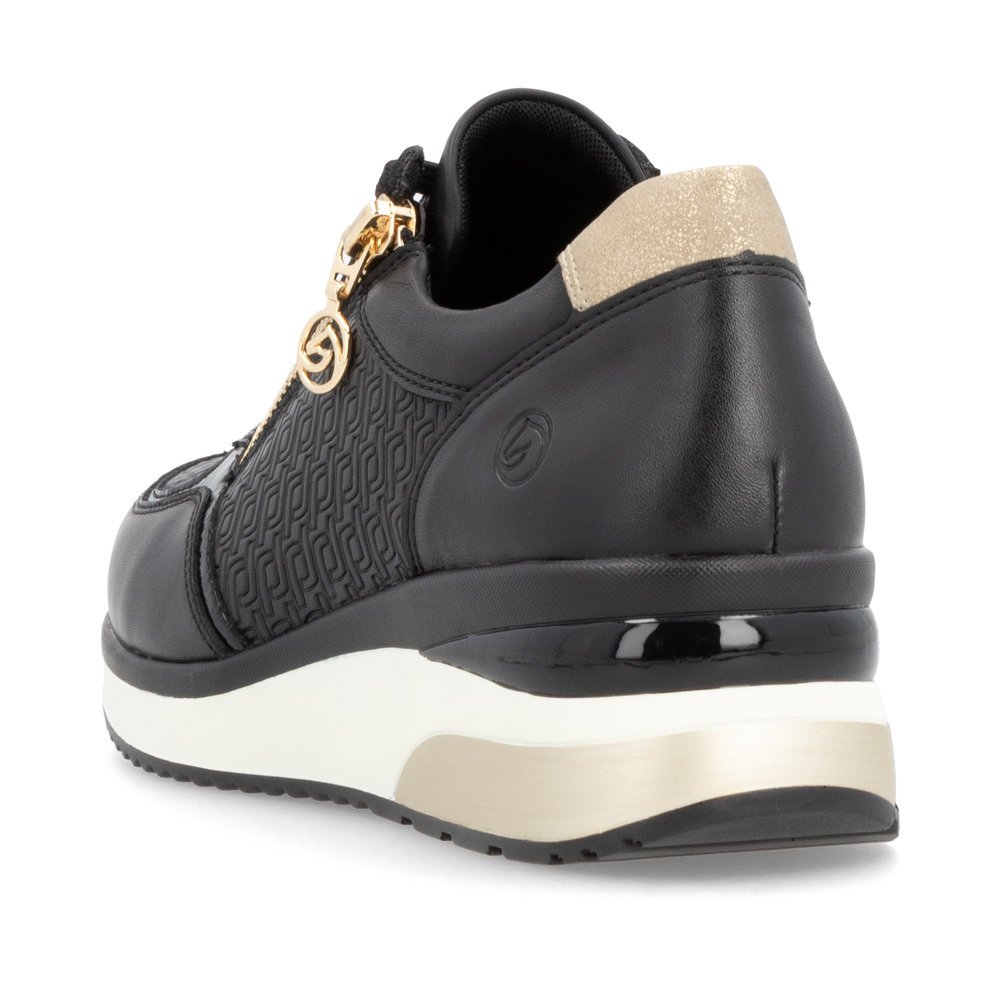 Black remonte women´s sneakers D2417-03 with a remonte pendant as well as a zipper. Shoe from the back.