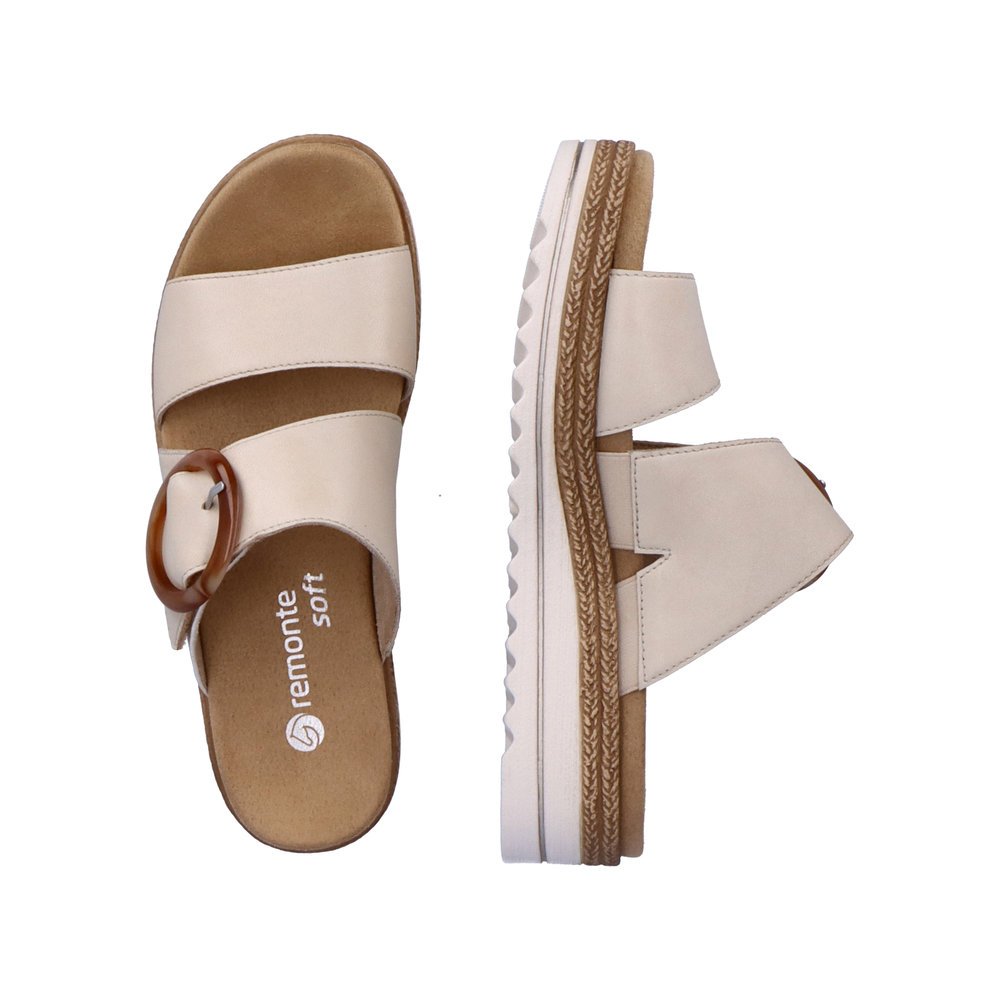Vanilla beige remonte women´s mules D0Q51-80 with a hook and loop fastener. Shoe from the top, lying.