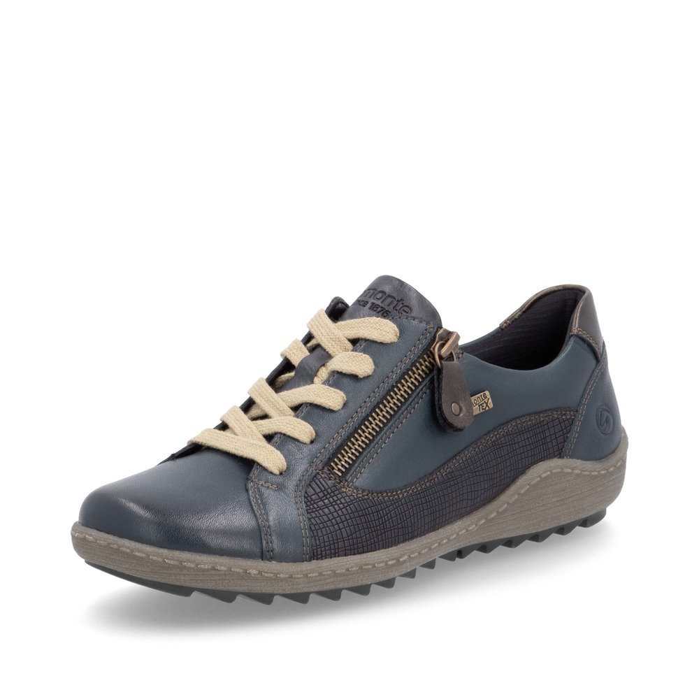 Chaussures à lacets remonte bleues pour femme R1440-14. Chaussure inclinée sur le côté.