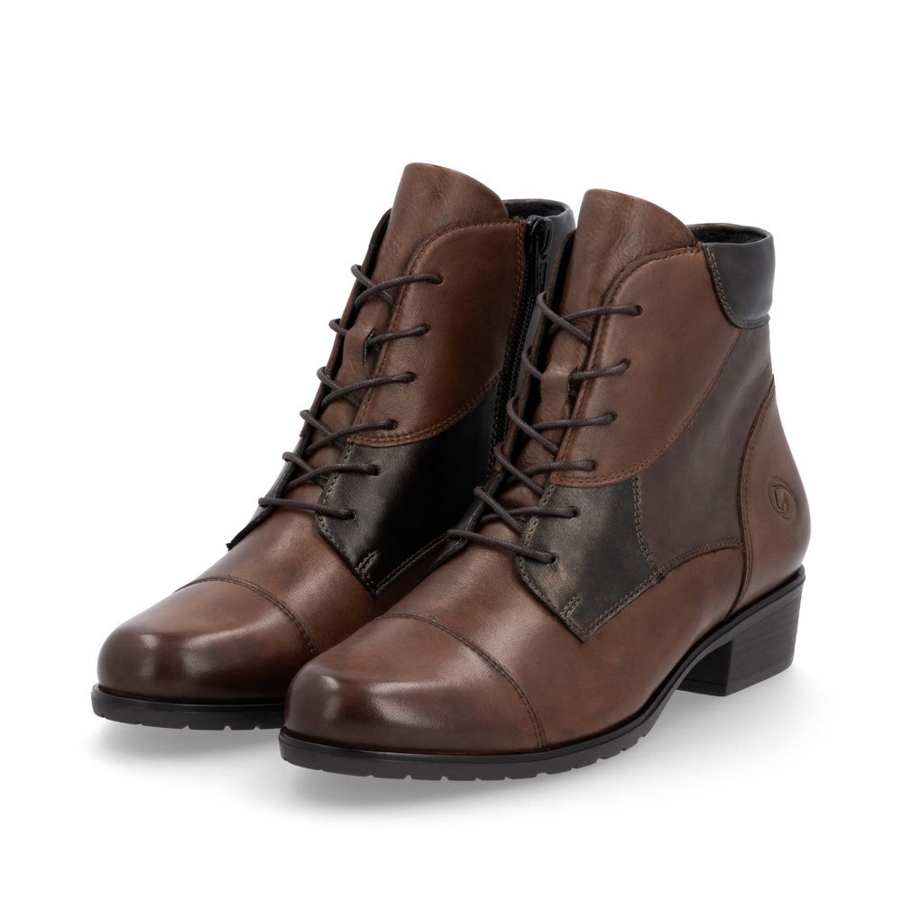 Maroon remonte women´s ankle boots D6882-23 with zipper as well as removable insole. Shoes laterally.