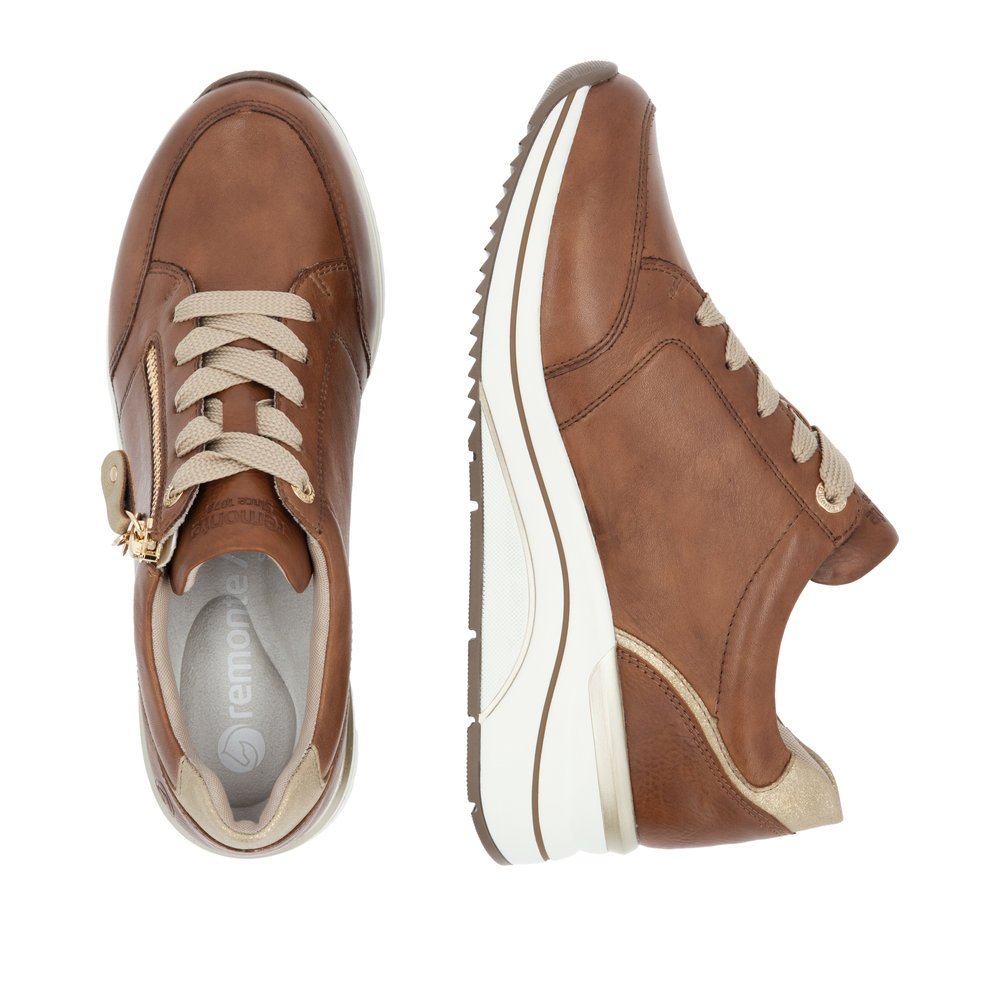 Brown remonte women´s sneakers D0T03-24 with a remonte pendant as well as a zipper. Shoe from the top, lying.