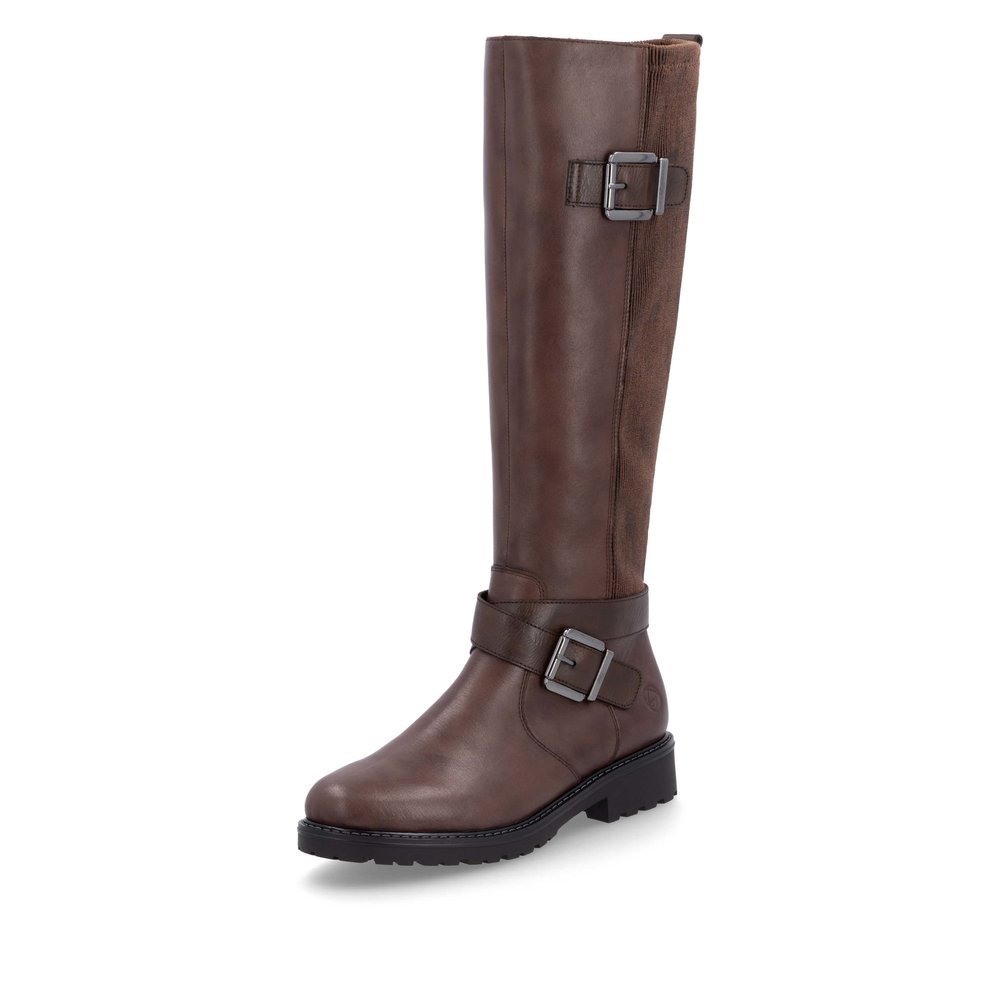 Brown remonte women´s high boots R6593-25 with decorative buckles as well as zipper. Shoe laterally.