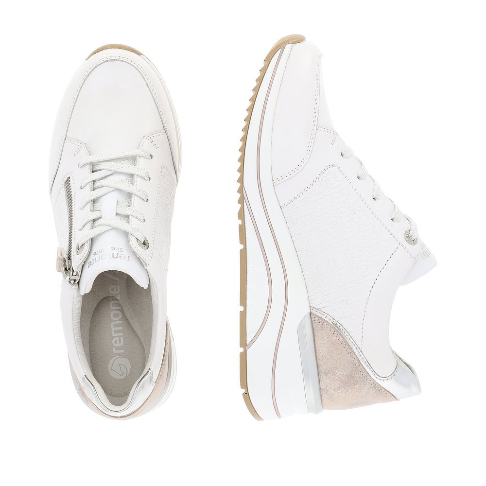 Brilliant white remonte women´s sneakers D0T03-80 with a zipper and extra width H. Shoe from the top, lying.
