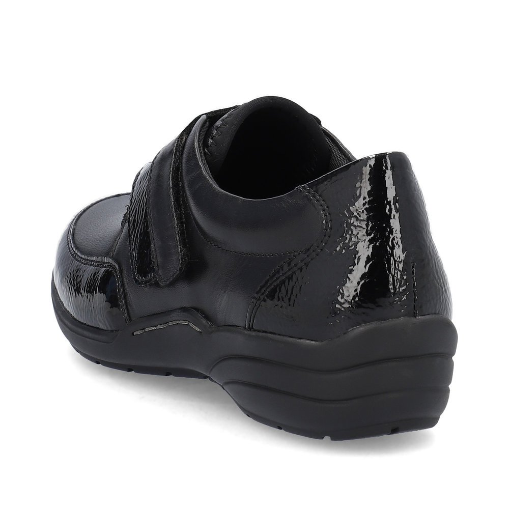 Chaussons remonte noirs pour femme R7600-04 avec fermeture velcro. Chaussure vue de l'arrière.