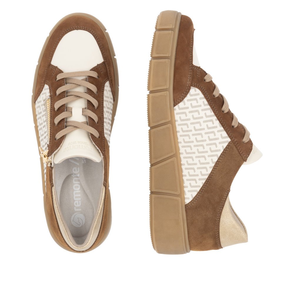 Beige remonte women´s sneakers D1T00-60 with a remonte pendant as well as a zipper. Shoe from the top, lying.