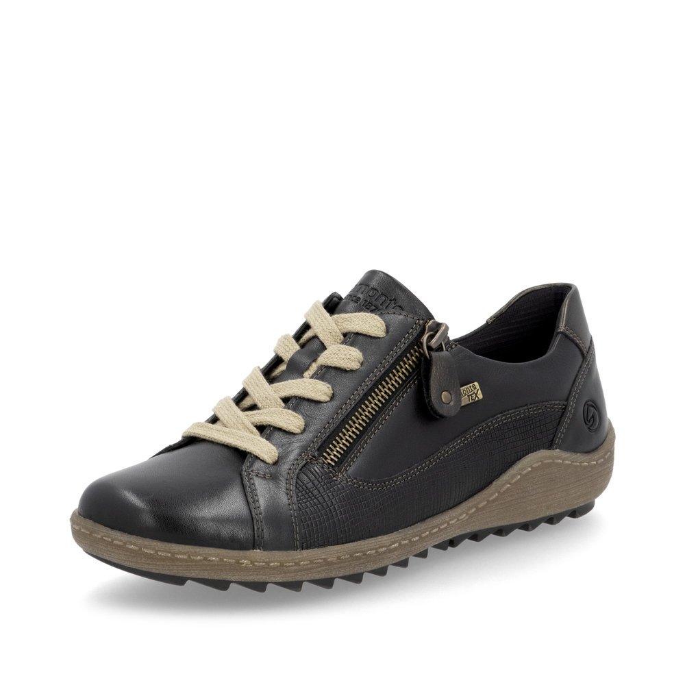 Chaussures à lacets remonte noires pour femme R1440-03. Chaussure inclinée sur le côté.