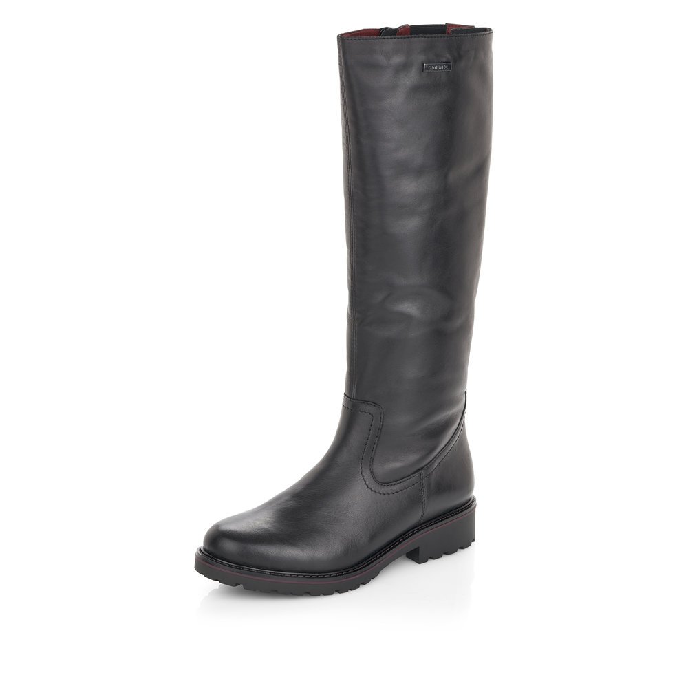 Black remonte women´s high boots R6576-01 with a zipper as well as comfort width G. Shoe laterally.