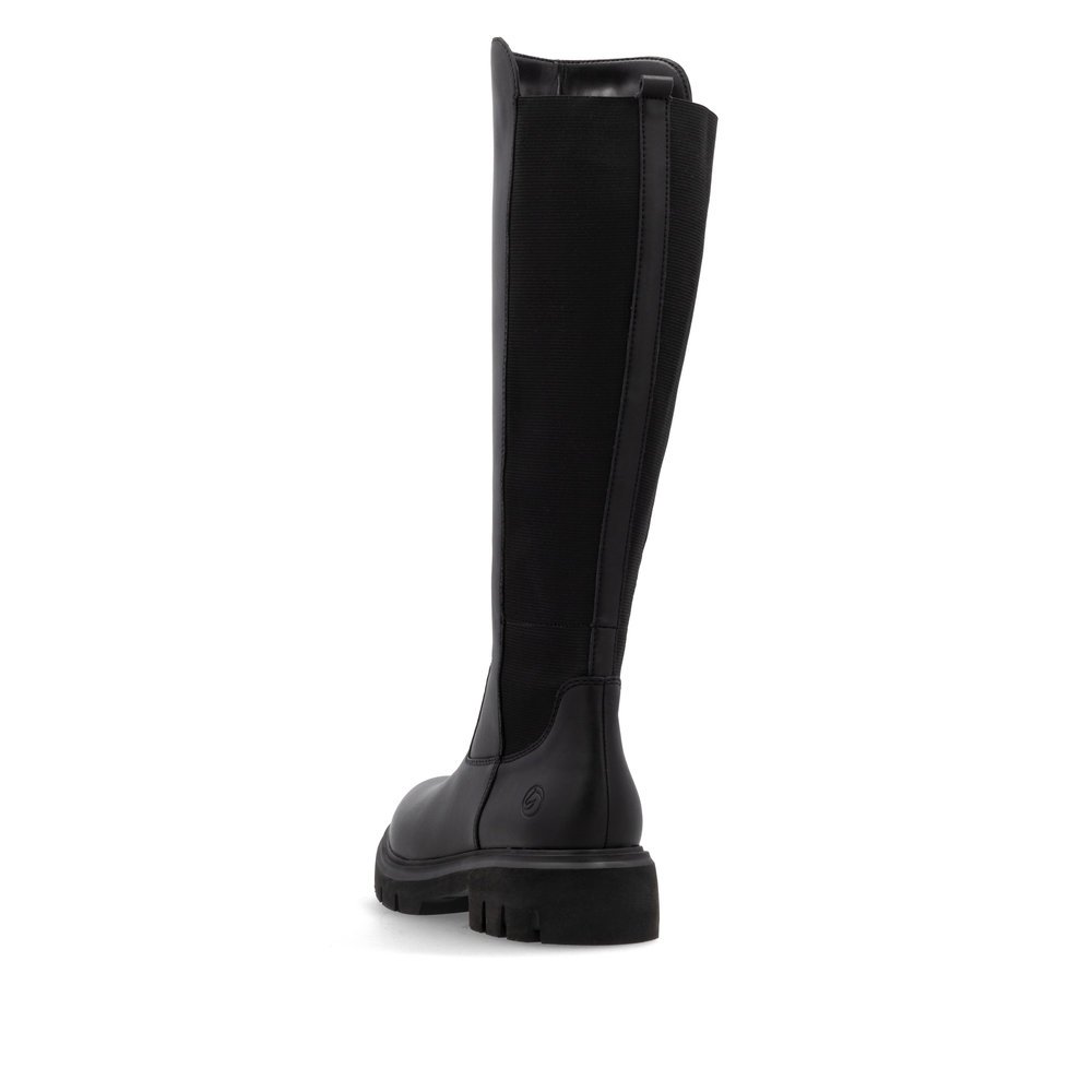 Black remonte women´s high boots D1W77-00 with a zipper as well as comfort width G. Shoe from the back.