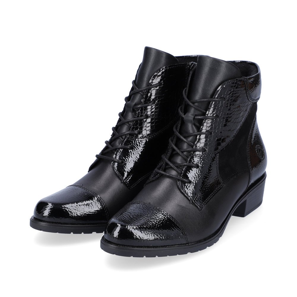 Bottines remonte noires pour femme D6882-01 avec fermeture éclair. Chaussures inclinées sur le côté.