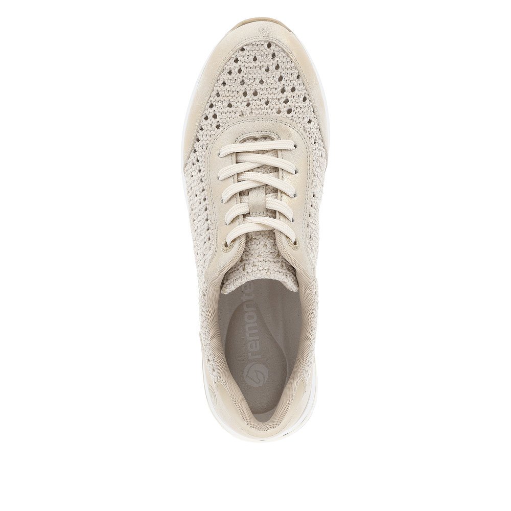 Beige remonte women´s sneakers D1G04-60 with a lacing and perforated look. Shoe from the top.
