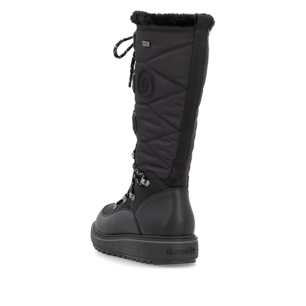 Night black remonte women´s high boots D0U77-00 with a Flip-Grip sole with spikes. Shoe from the back.